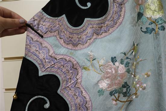 A Chinese embroidered silk robe, eau de nil ground, late Qing